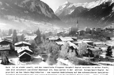 Beautiful winter view of a snow-covered village in Kaprun, surrounded by mountains, with old buildings in the snow. | © esg
