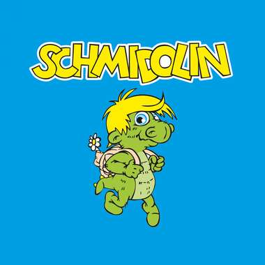 Cartoon character of Schmidolin with a big grin and blond hair on a blue background, with the text "Schmidolin" at the top. | © Schmittenhöhe