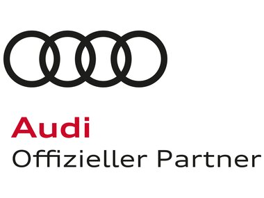 Audi logo with four rings and the text 'Audi Official Partner'. | © Audi